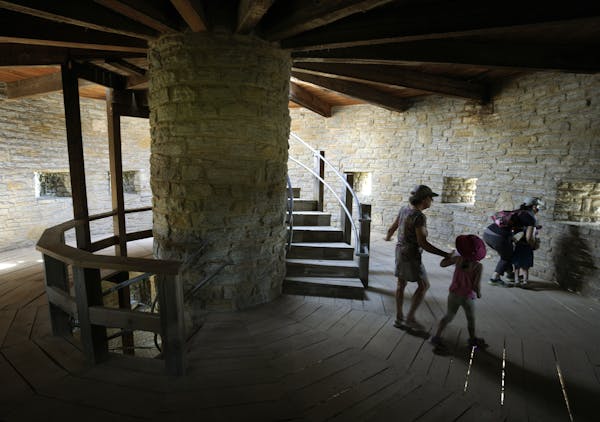 A family tours the Round Tower in June 2021.