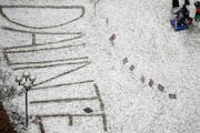 “Daunte” is written in the snow Wednesday outside the Hennepin County Government Center during the jury deliberations in the trial of ex-Brooklyn 