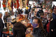 Last-minute Christmas shoppers packed the Patina store Wednesday in Golden Valley. 