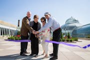 St. Paul Parks and Recreation Director Mike Hahm, Rep. Alice Hausman, Nancy Nelson and Greg McNeely cut the ribbon during a ceremony for the Centennia