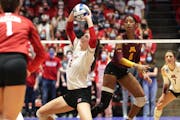 Wisconsin’s Sydney Hilley (2) set the ball in an eventual win against the Gophers on Dec. 11 in an NCAA regional final.
