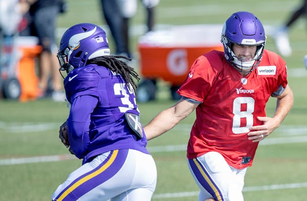 Vikings quarterback Kirk Cousins handed the ball to running back Dalvin Cook during practice at TCO Performance Center, Wednesday, September 23, 2020 