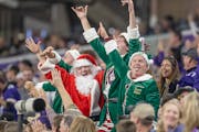 Santa Claus and a few elves cheered for the Vikings on Dec. 9 against Pittsburgh.