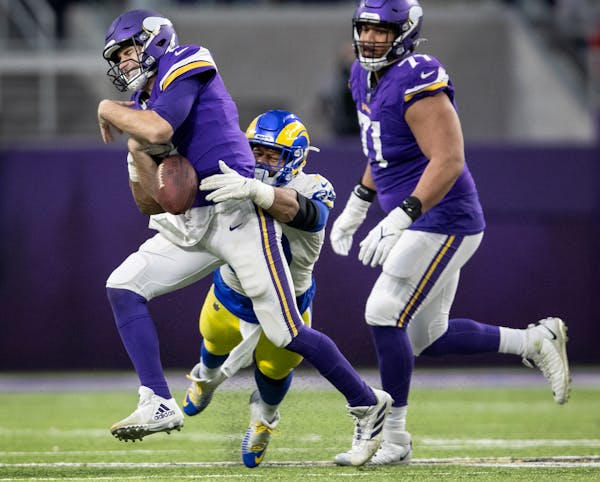 Aaron Donald of the Rams forced Vikings quarterback Kirk Cousins to fumble in the fourth quarter Sunday.