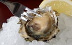 Meritage offers a variety of oysters at its raw bar.
