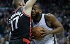 New Wolves big man Greg Monroe (right, shown with Milwaukee in 2017) got quality minutes against the Celtics on Monday night in his first NBA game in 