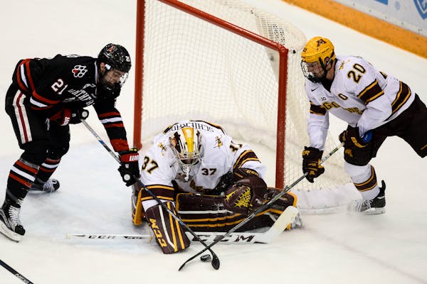 Nolan Stevens, left, played for Northeastern in 2015 when he faced the Gophers in a game at Mariucci Arena.