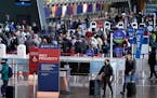 Security checkpoints at Logan International Airport in Boston on Nov. 24, 2021.
