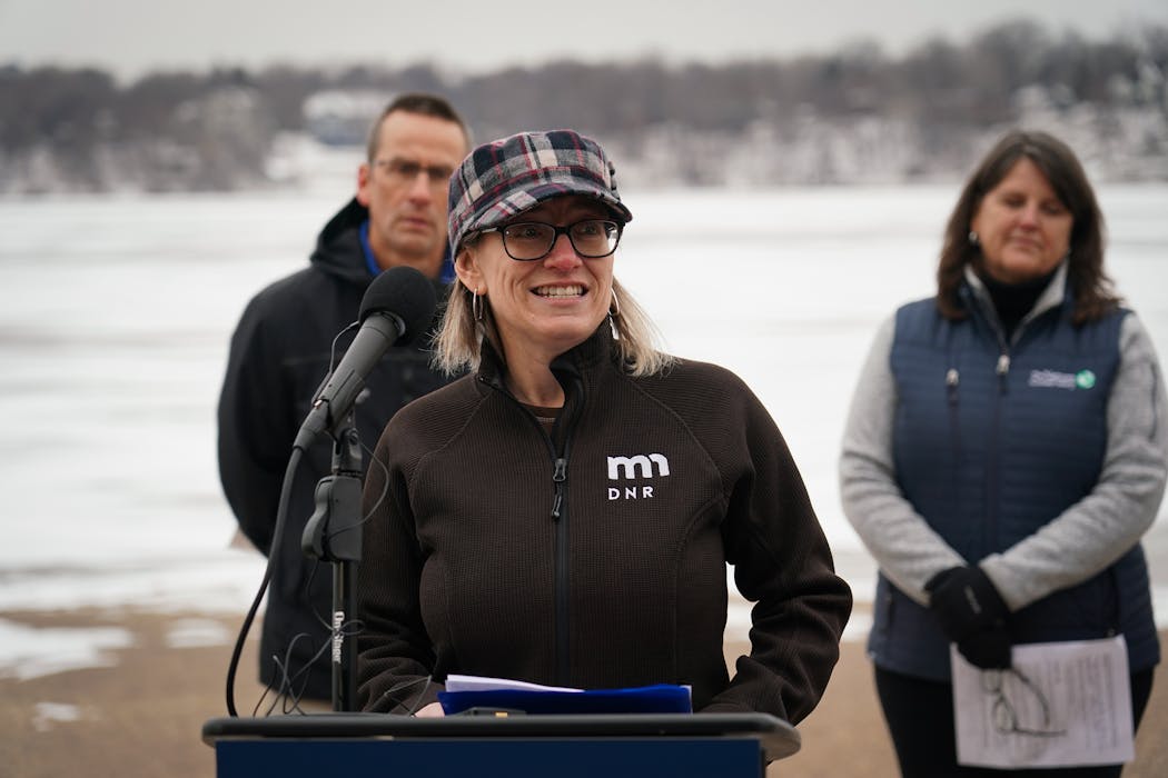 Spokespeople from the Minnesota DNR and MPCA explain how climate change is affecting winter seasons at the Medicine Lake boat launch, in Plymouth, Minn., Friday, Dec. 10, 2021. In this photo is Sarah Strommen, DNR Commissioner. ] SHARI L. GROSS • shari.gross@startribune.com