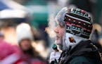 Eric Conrad waited in line for a drink outside Target Field in temperatures hovering around 5 below zero during the Winter Classic pregame festivities