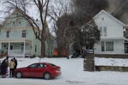 A New Year’s Day explosion and fire leveled one Minneapolis garage, set another one ablaze and sent a man to the hospital.