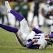 Vikings rookie quarterback Kellen Mond made his NFL debut Sunday night in the fourth quarter. He was hit hard by Packers linebacker Rashan Gary.