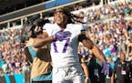 Minnesota Vikings receiver K.J. Osborn (17) celebrated after catching a game winning a 27-yard touchdown reception in overtime.