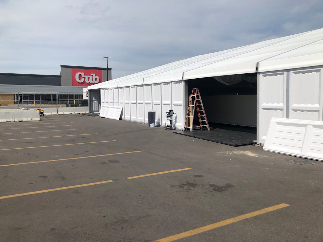Cub Foods set up a temporary structure in the parking lot of its Lake Street location, which was heavily damaged in the riots after the police killing of George Floyd. It rebuilt and reopened the store about eight months later.