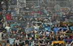 Minnesota United fans held their scarves up to celebrate a win over the Los Angeles Galaxy last season.