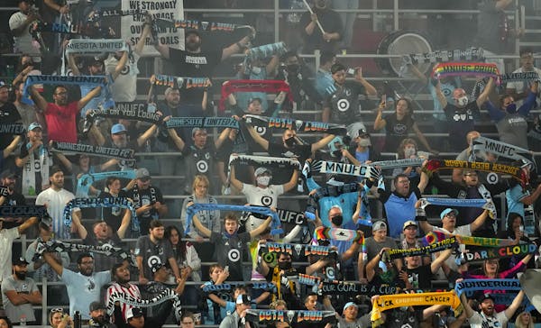 Minnesota United fans held their scarves up to celebrate a win over the Los Angeles Galaxy last season.