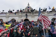 Pro-Trump supporters pushed back against police at the U.S. Capitol in Washington, D.C., on Jan. 6, 2021.
