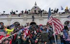 Pro-Trump supporters pushed back against police at the U.S. Capitol in Washington, D.C., on Jan. 6, 2021.