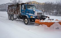 A Minneapolis snow plow cleared a downtown street in 2019. Gunfire struck a city snowplow Sunday, Jan. 23, 2022, after a collision in the city’s far