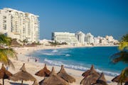 Resort hotels line the beach in Cancun, Mexico.