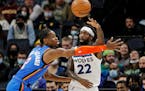 Timberwolves guard Patrick Beverley passes the ball over Oklahoma City guard Shai Gilgeous-Alexander on Wednesday