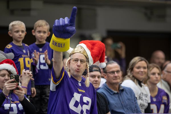 Tim Stepp of Lakeville found a spot for his Santa hat as he cheered on the Vikings in December.