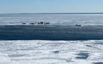 Stranded anglers awaited rescue after an ice floe broke away from the Lake Superior shoreline near Duluth in 2021. The Duluth Fire Department responde