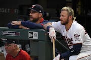 Manager Rocco Baldelli and third baseman Josh Donaldson looked on during a game at Target Field in 2021. Donaldson was one of five Twins to earn more 