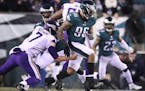 Eagles defensive end Derek Barnett (96) knocked the ball away from Vikings quarterback Case Keenum for a second-quarter fumble in the NFC Championship