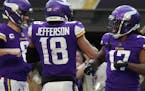 Minnesota Vikings wide receiver K.J. Osborn (17) celebrated a touchdown with quarterback Kirk Cousins (8) and wide receiver Justin Jefferson (18) in t