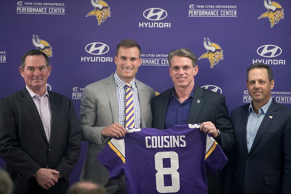 From left, Minnesota Vikings head coach Mike Zimmer, quarterback Kirk Cousins, general manager Rick Spielman and co-owner Mark Wilf at the Vikings TCO