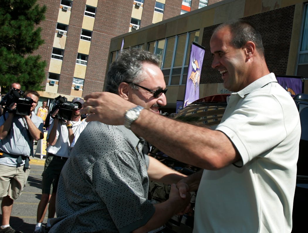 Zygi Wilf, who had just taken ownership of the Vikings, shook hands with coach Mike Tice at training camp at Minnesota State Mankato in 2005.