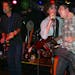 Jeff Tweedy, right, lifted up Gary Louris during a drag-down, knock-out Golden Smog performance at the 400 Bar in 2003 also with Son Volt alum Jim Boq