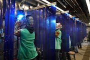 Pine Technical and Community College welding students worked in the college’s mobile welding lab in Pine City, Minn.