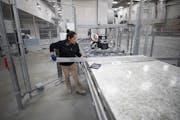 Patty Ruiz works during her shift at Cambria. The company’s CEO said private sector mandates put companies like his “in a real pickle” over priv