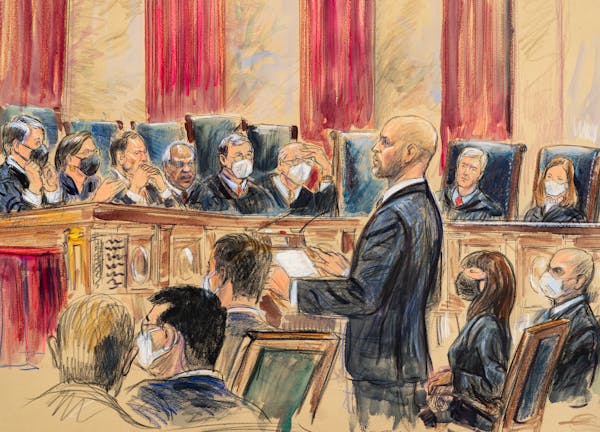This artist sketch depicts lawyer Scott Keller standing to argue on behalf of more than two dozen business groups seeking an immediate order from the 