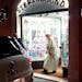In this image from video made available by Javier Martinez Brocal of Rome Reports, Pope Francis leaves a record shop in Rome, Tuesday, Jan. 11, 2022. 