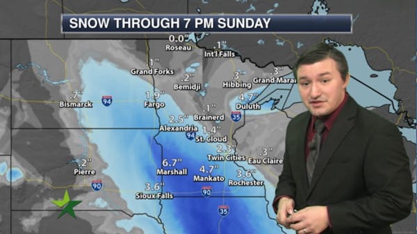 Afternoon forecast: More snow, ending in evening; high 20