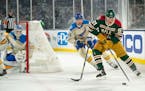 Kirill Kaprizov of the Wild skated behind the net during the Winter Classic on New Year’s Day.