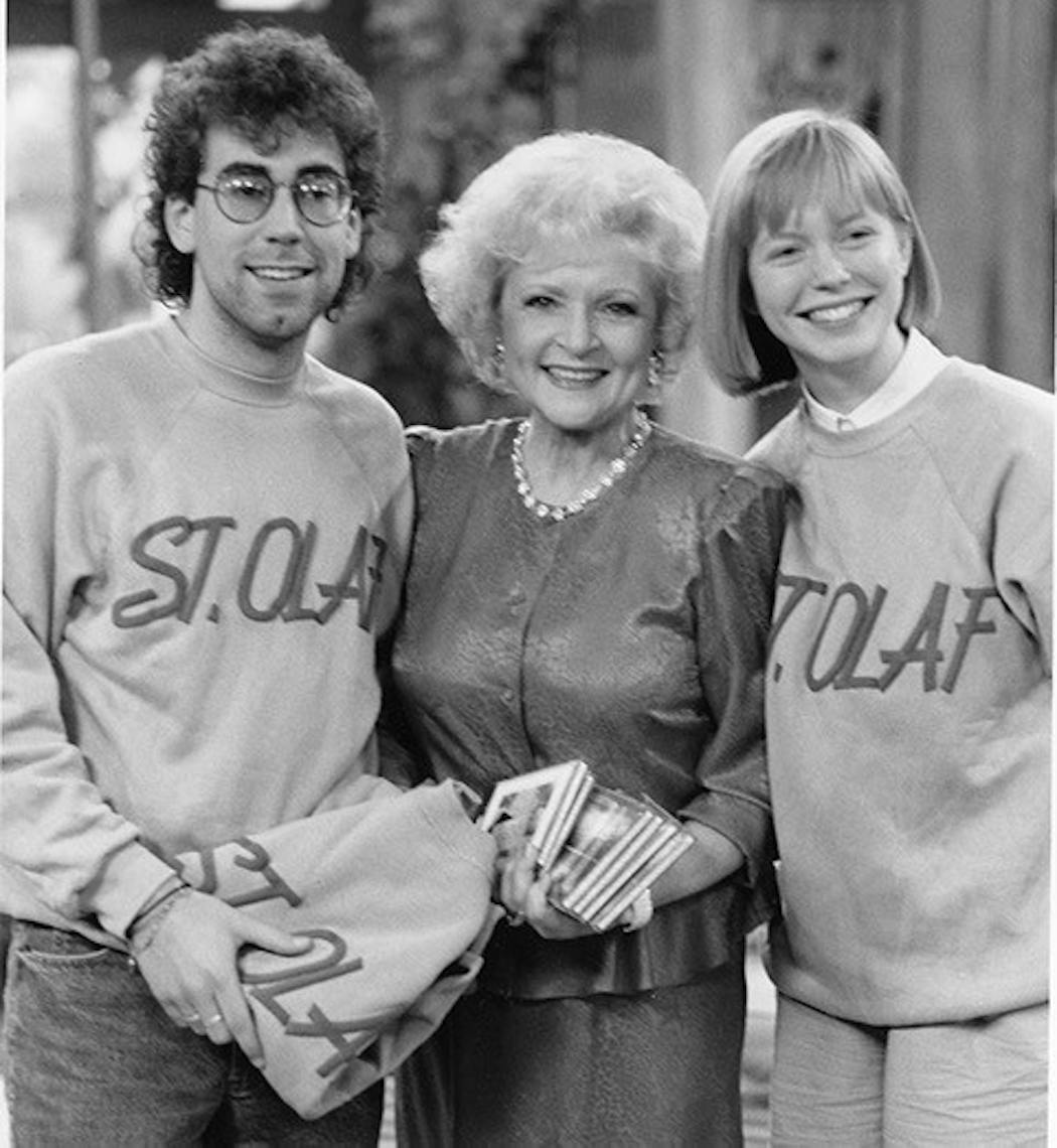Betty White with St. Olaf College choir singers in 1989, when the choir visited Los Angeles and attended a taping of “The Golden Girls.” White and co-star Rue McClanahan greeted the choir with a rendition of “Um Yah Yah!” — St. Olaf’s fight song.