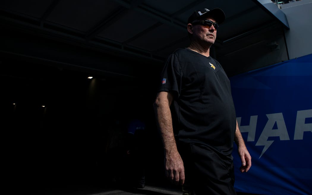 Former Vikings head coach Mike Zimmer stood in the tunnel of SoFi Stadium in California. The Vikings won that day over the Chargers, one of just eight victories this season.