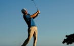 Russell Henley plays his shot from the 17th tee during the third round of the Sony Open