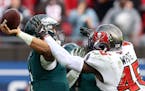 Buccaneers inside linebacker Devin White smashed into Eagles quarterback Jalen Hurts as he attempted to pass during the second half of Tampa Bay’s 3