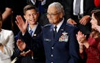Tuskegee airman Charles McGee and his great-grandson Iain Lanphier reacted as President Donald Trump delivers his State of the Union address to a join
