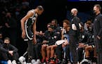 Brooklyn Nets forward Kevin Durant (7) leaves the game after injuring his knee during the first half.