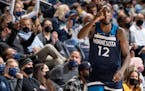 Most fans at Target Center behind Wolves forward Taurean Prince on Sunday night wore masks.