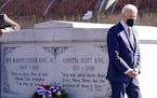 President Joe Biden walks away after a wreath laying at the tomb of the Rev. Martin Luther King Jr., and his wife Coretta Scott King, Tuesday, Jan. 11