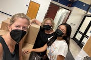 Kristy Wesson and Margie Solomon of the National Council of Jewish Women Minnesota and student Elif Ozturk deliver menstrual products to Hopkins High 