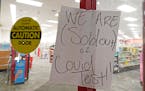 A sign was posted at the front of this CVS pharmacy in Jackson, Miss., on Jan. 3. Across the country, people struggle to find at-home COVID tests.