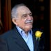 Colombian Nobel Literature laureate Gabriel Garcia Marquez greets fans and reporters outside his home on his 87th birthday in Mexico City, March 6, 20